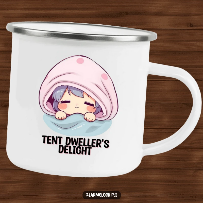 Funny camping mug with a groggy character peeking from under a blanket, ideal for sipping hot beverages during peaceful, slow mornings in nature.