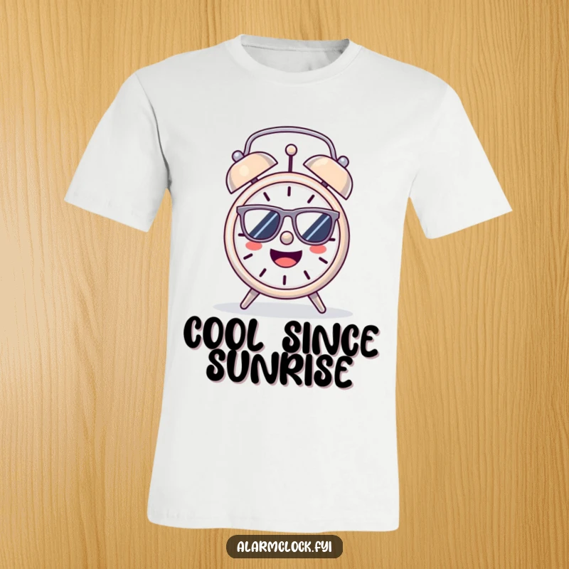 Funny T-Shirt: A stylish alarm clock wearing sunglasses, basking joyfully in the bright morning sun.